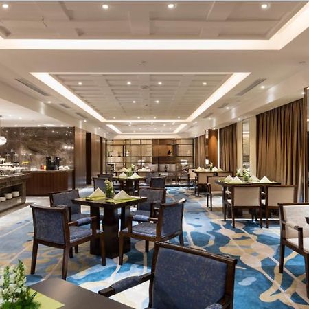 The Qube Hotel Jingzhou Exterior photo